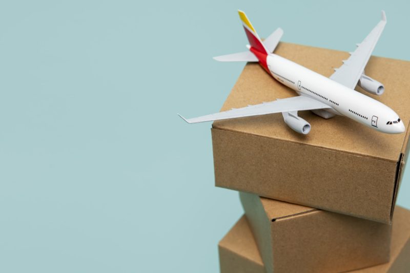 plane-cardboard-boxes-high-angle